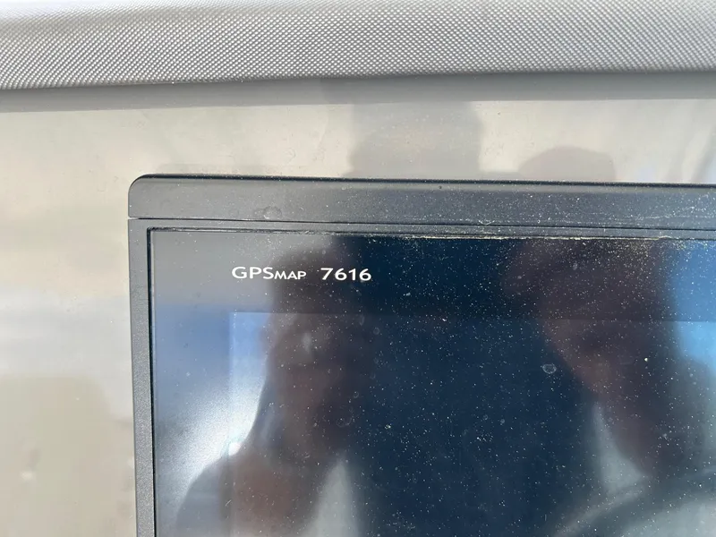 Slide: The Image of GPSMAP 7616 display on 2015 Pursuit DC 325 Dual Console boat. - 16