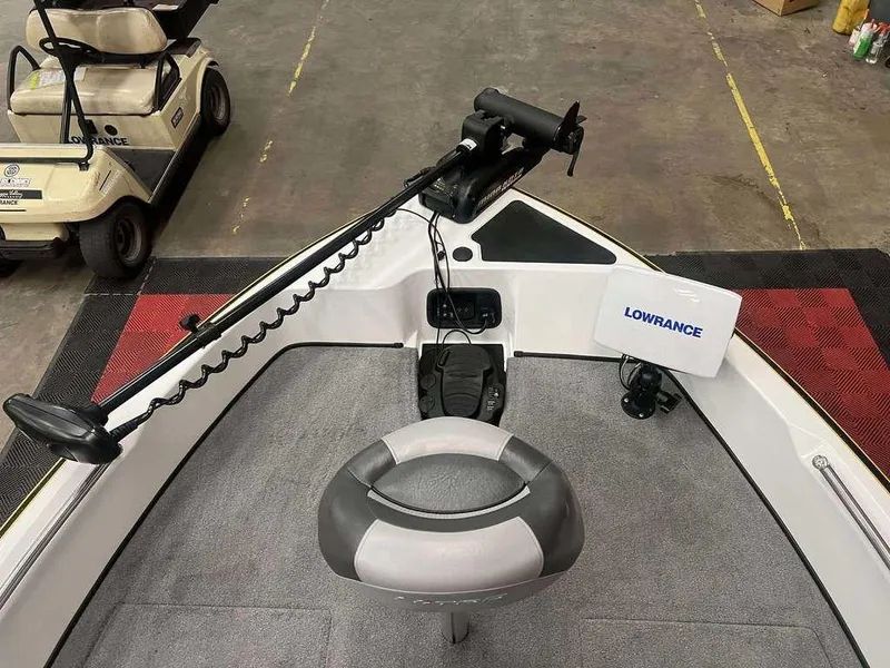 Slide: The Image of 2014 Nitro ZV 21 boat interior with Lowrance equipment and trolling motor. - 4