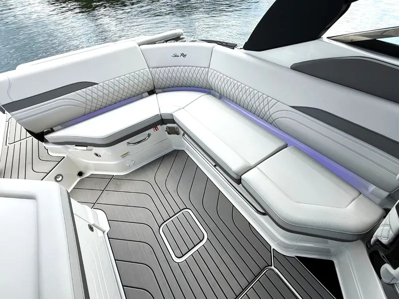 Slide: The Image of The image shows the luxurious cockpit of a Sea Ray SLX 280 boat with elegant seating. - 16