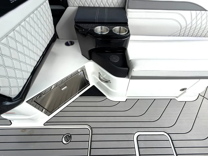 Slide: The Image of The image shows the stylish interior of a Sea Ray SLX 280 with elegant seating and cup holders. - 18