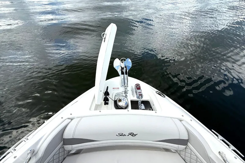 Slide: The Image of The image shows the bow of a 2026 Sea Ray SLX 280 boat on calm water. - 8