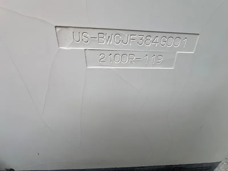 Slide: The Image of Hull identification number on a 2001 Boston Whaler 21 Outrage boat. - 3