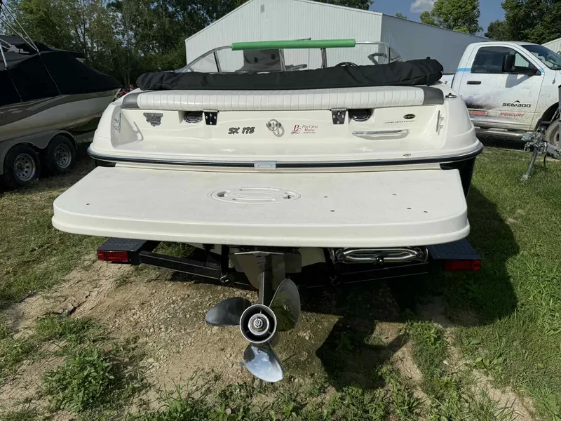 Slide: The Image of 2006 Glastron SX 175 boat rear view with propeller and swim platform. - 4