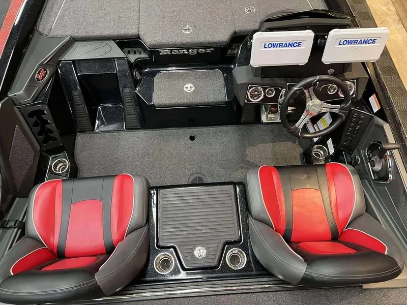 Slide: The Image of 2022 Ranger Z519 boat interior with dual Lowrance displays and red-black seating. - 4