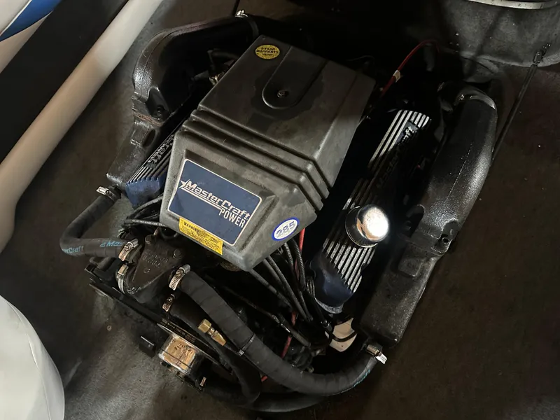 Slide: The Image of 1993 MasterCraft ProStar 190 engine compartment, showcasing the powerful motor components. - 14