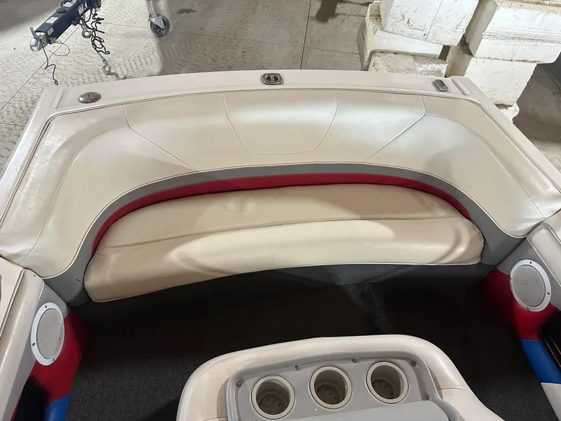 Slide: The Image of 1993 MasterCraft ProStar 190 boat interior with white and red seating. - 8