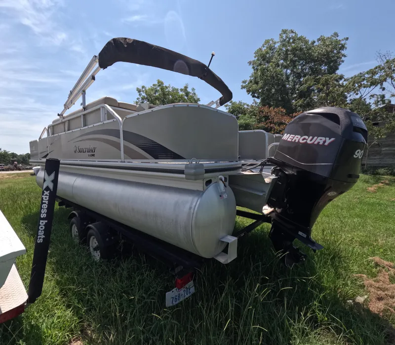 Slide: The Image of 2011 Lowe Suncruiser SF214 pontoon boat with Mercury 90 engine on trailer. - 3