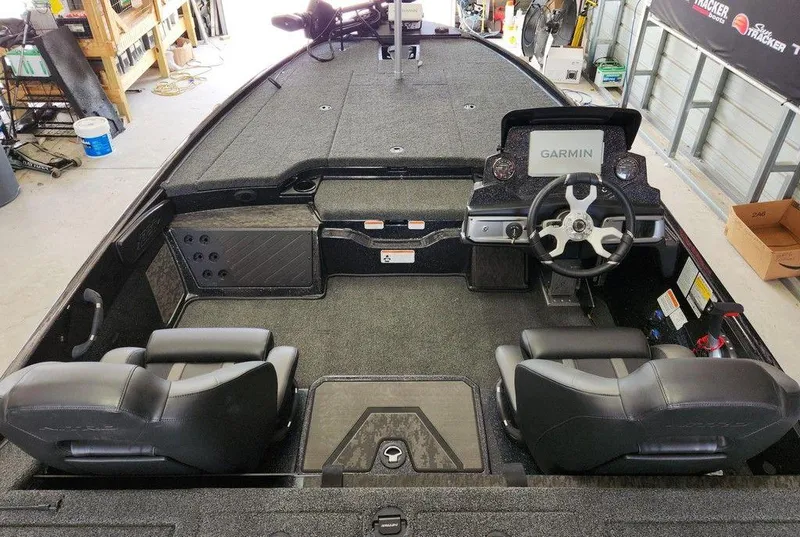 Slide: The Image of 2026 Nitro Z20 XL Pro boat interior with Garmin navigation system and dual seating. - 7