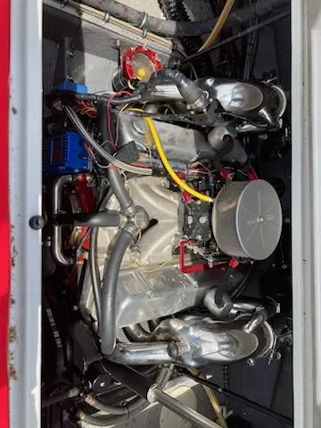 Slide: The Image of Engine of a 1988 Donzi R23 boat, showcasing intricate mechanical components. - 7