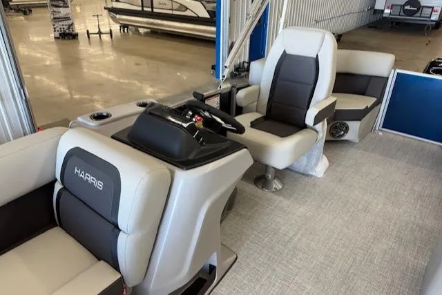 Slide: The Image of Interior of 2025 Harris CR190 boat with modern seating and control console. - 15