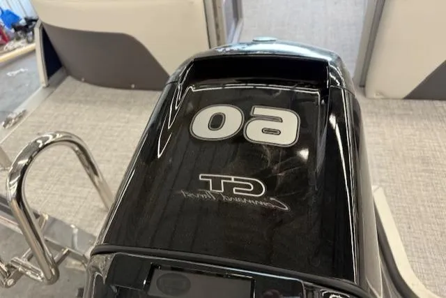 Slide: The Image of Outboard motor on a Harris CR190 boat, 2025 model, with sleek black design. - 4