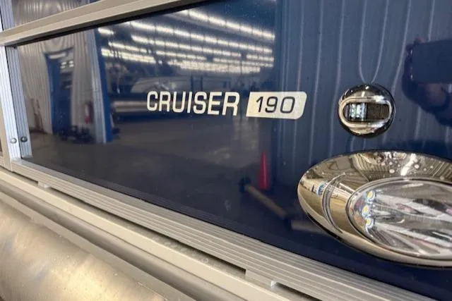 Slide: The Image of 2025 Harris CR190 Cruiser 190 boat detail in a showroom setting. - 8