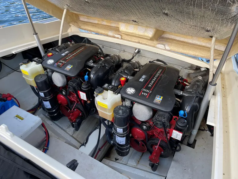 Slide: The Image of Twin engines in a 2015 Chris-Craft 32 Launch boat, showcasing powerful marine engineering. - 30