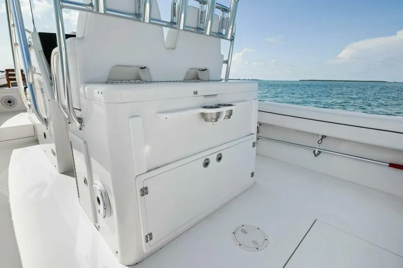 Slide: The Image of 2012 Regulator 32 FS boat interior with seating and ocean view. - 11