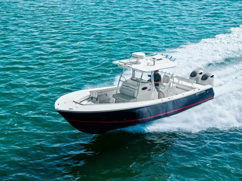 Slide: The Image of 2012 Regulator 32 FS boat cruising on open water. - 34