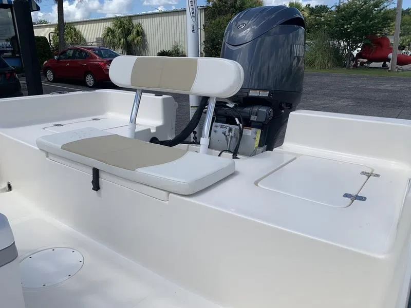 Slide: The Image of 2025 Bulls Bay 2200 boat with Yamaha outboard motor and cushioned seating. - 10