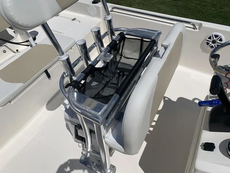Slide: The Image of 2025 Bulls Bay 2200 boat interior with seating and rod holders. - 14