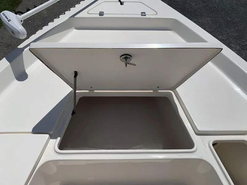 Slide: The Image of 2025 Bulls Bay 2200 boat storage compartment with open hatch, showcasing spacious interior. - 21