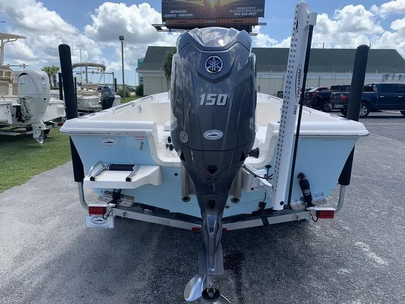 Slide: The Image of 2025 Bulls Bay 2200 boat with Yamaha 150 engine, parked outdoors. - 3