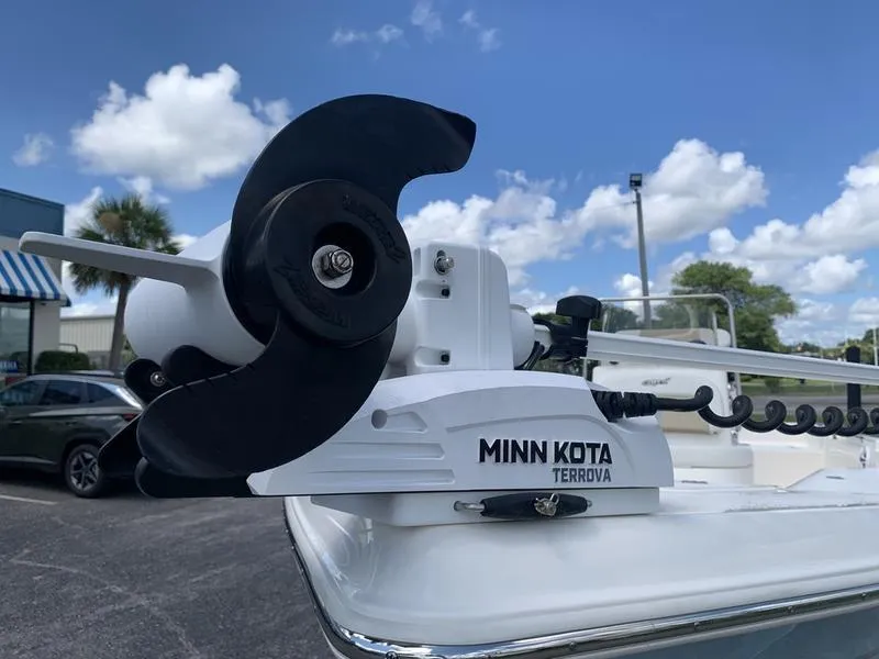 Slide: The Image of Minn Kota Terrova motor on 2025 Bulls Bay 2200 boat under blue sky. - 9