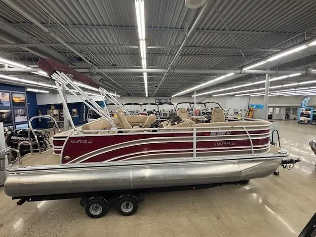 The Image of 2016 Harris Solstice 220 SL pontoon boat in showroom, side view. - 1