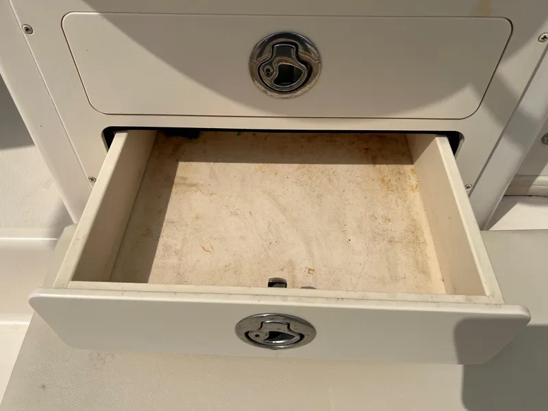 Slide: The Image of Open storage drawer on 2008 Grady-White 282 Sailfish WA boat. - 16