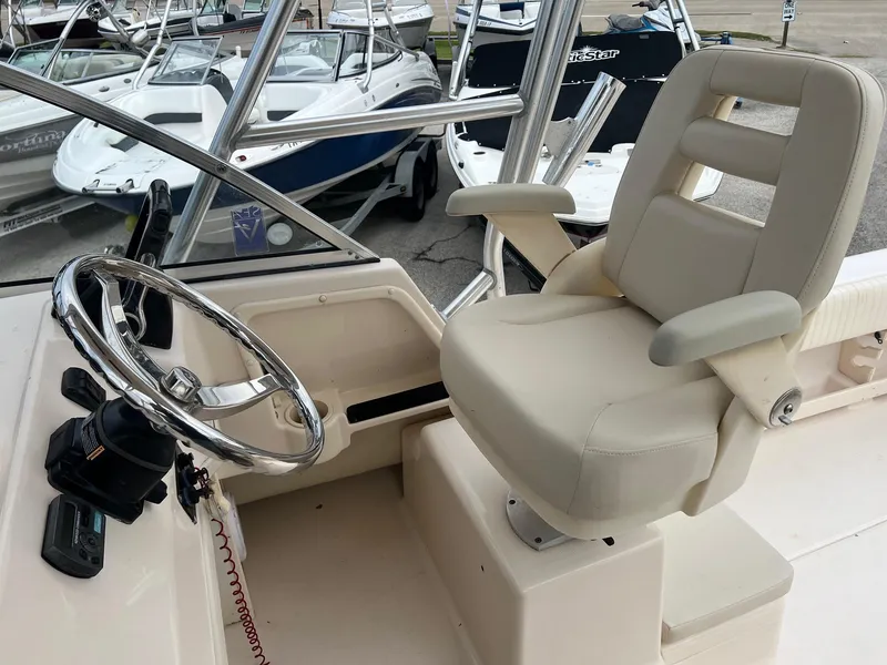 Slide: The Image of Helm of 2008 Grady-White 282 Sailfish WA with steering wheel and captain's chair. - 20