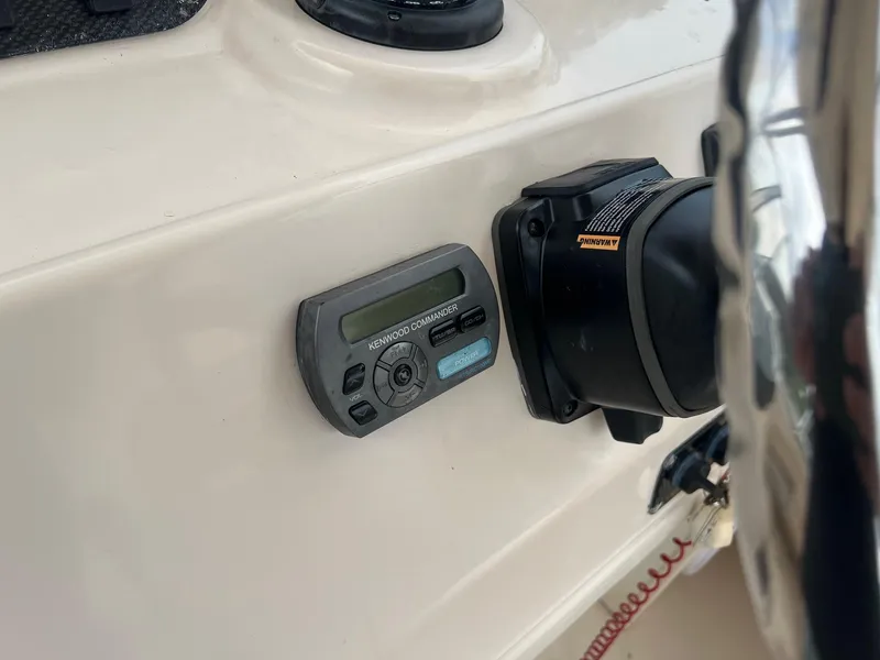 Slide: The Image of Kenwood Commander on 2008 Grady-White 282 Sailfish WA boat dashboard. - 22
