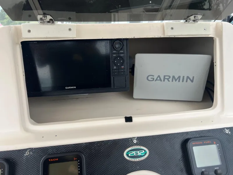 Slide: The Image of Garmin navigation system on 2008 Grady-White 282 Sailfish WA boat dashboard. - 26