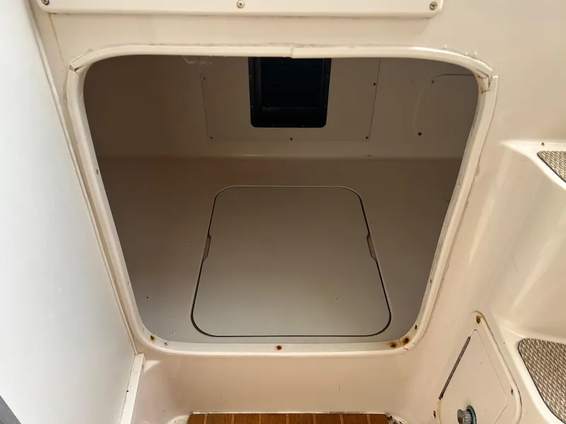 Slide: The Image of 2008 Grady-White 282 Sailfish WA cabin entrance, showcasing interior space and design. - 28