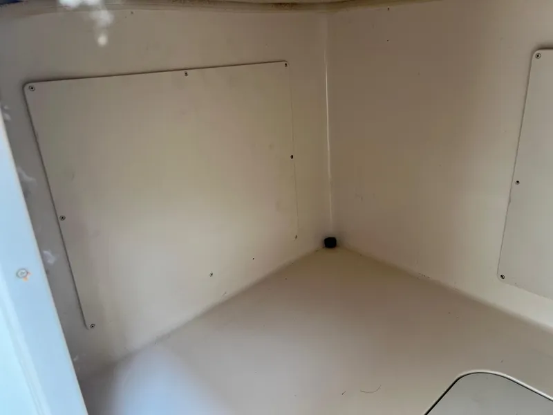 Slide: The Image of Empty interior compartment of a 2008 Grady-White 282 Sailfish WA boat. - 30