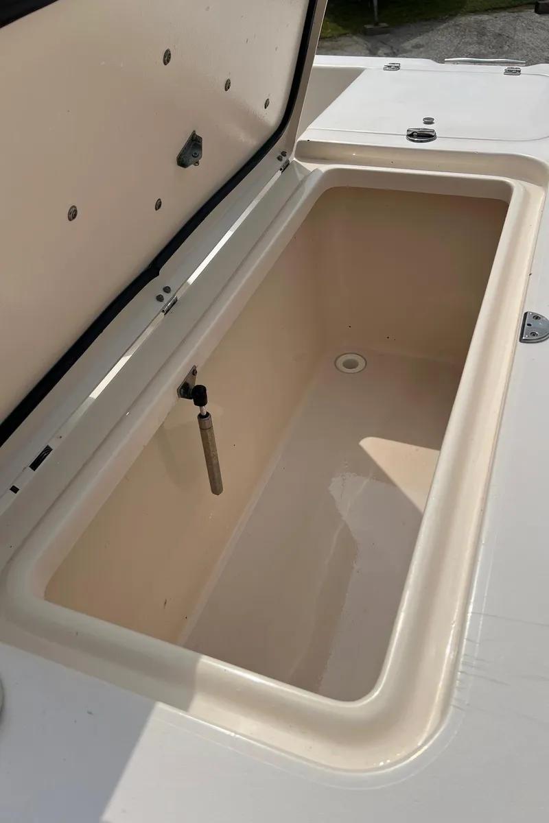 Slide: The Image of Open storage compartment on 2008 Grady-White 282 Sailfish WA boat. - 35