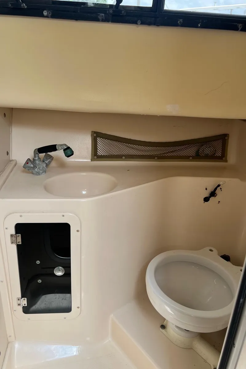 Slide: The Image of 2008 Grady-White 282 Sailfish WA boat interior with sink and toilet. - 39