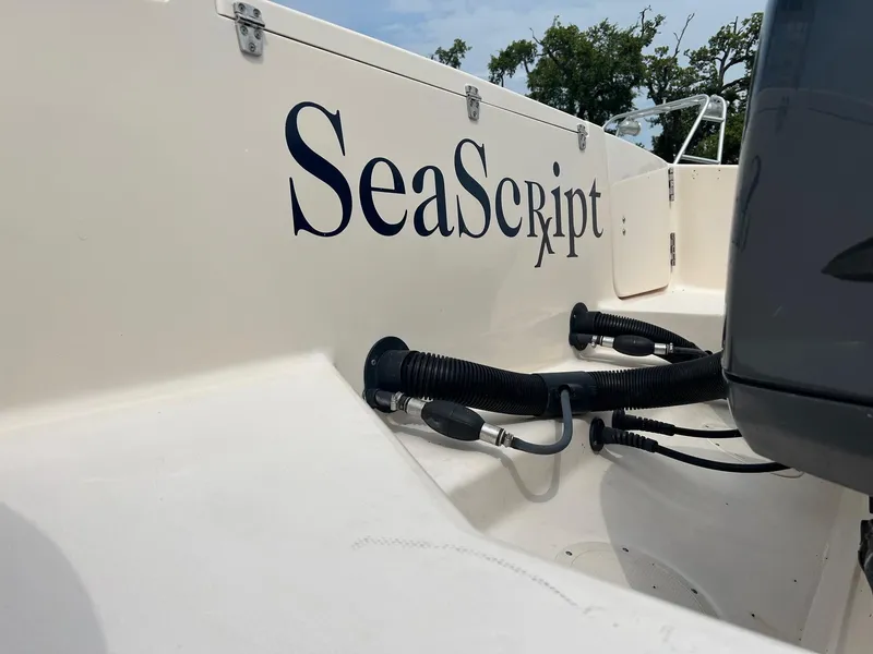 Slide: The Image of 2008 Grady-White 282 Sailfish WA boat with "SeaScript" name on the side. - 5
