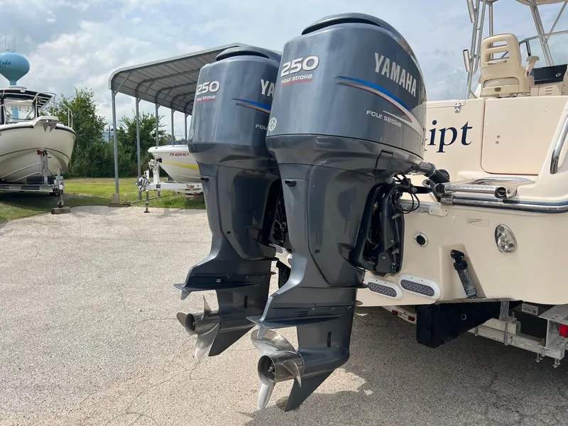 Slide: The Image of Twin Yamaha 250 outboard motors on a 2008 Grady-White 282 Sailfish WA boat. - 6