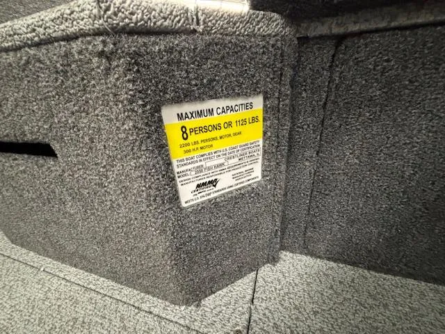 Slide: The Image of 2025 Crestliner 2050 Fish Hawk capacity label, 8 persons or 1125 lbs. - 19