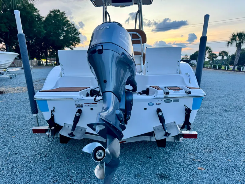 Slide: The Image of 2017 Sea Fox 186 Commander boat with outboard motor at sunset. - 2