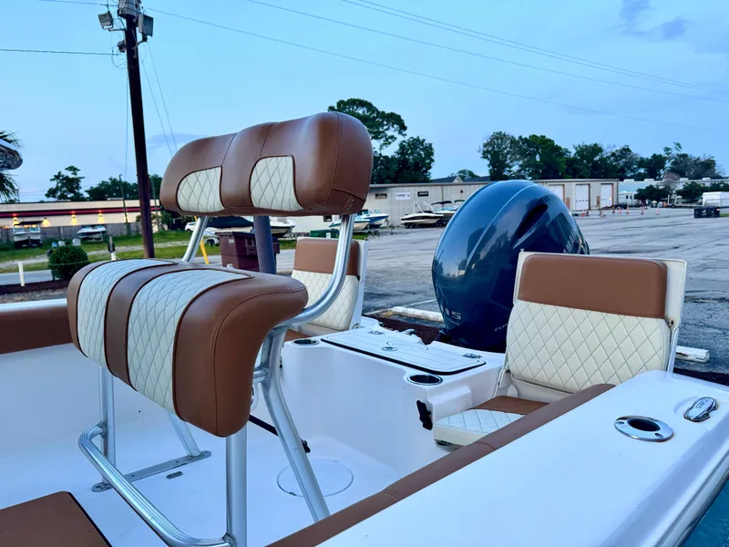 Slide: The Image of 2017 Sea Fox 186 Commander boat interior with brown and white seating. - 3