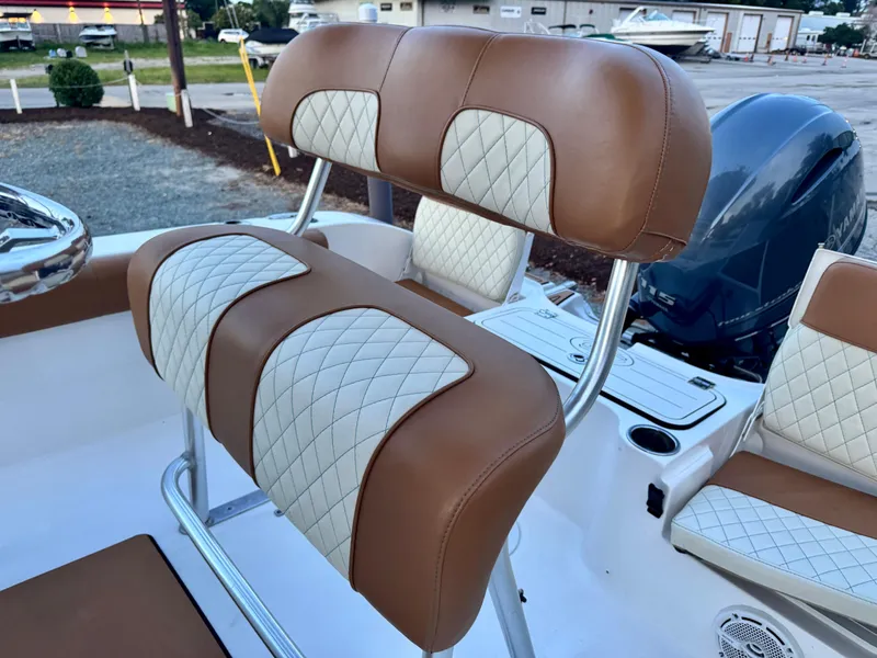 Slide: The Image of Brown and white cushioned seating on 2017 Sea Fox 186 Commander boat. - 4