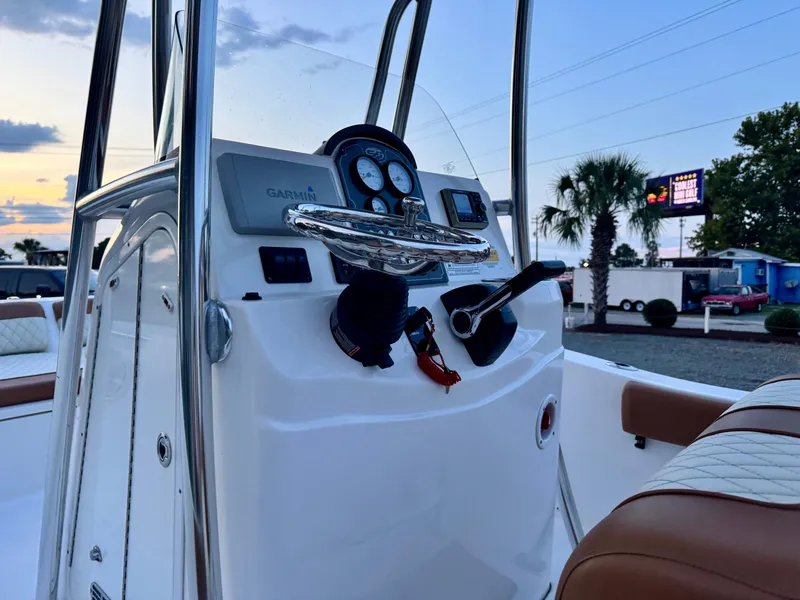 Slide: The Image of 2017 Sea Fox 186 Commander boat console with Garmin navigation at sunset. - 5
