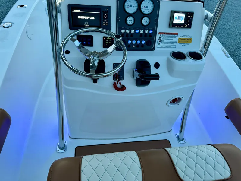 Slide: The Image of 2017 Sea Fox 186 Commander boat dashboard with steering wheel and controls. - 6
