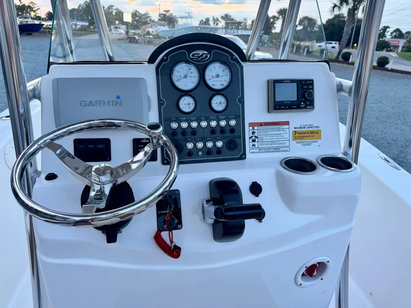 Slide: The Image of 2017 Sea Fox 186 Commander boat dashboard with Garmin navigation and control panel. - 7