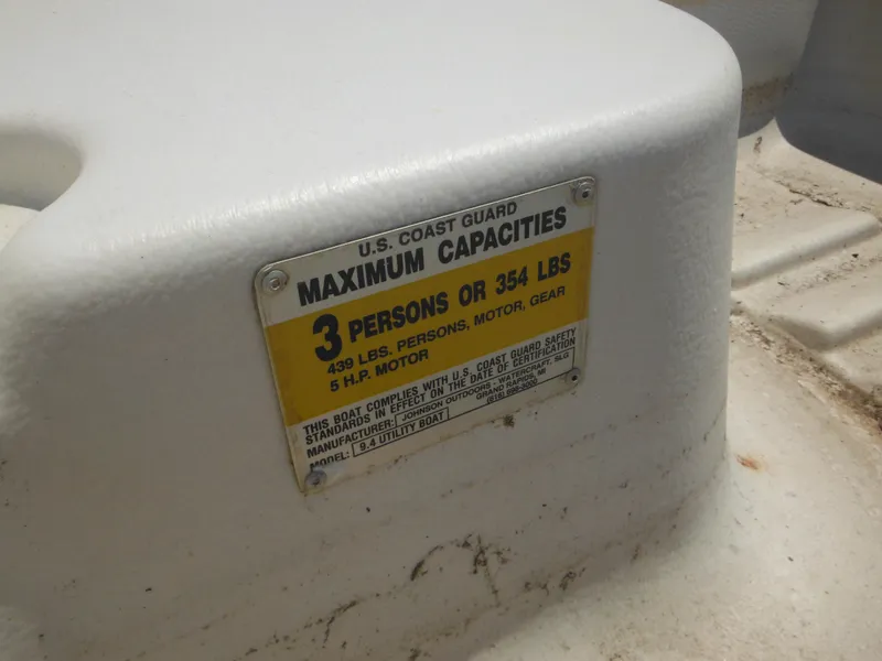 Slide: The Image of Sun Dolphin WATERTENDER 9.4 boat capacity label, 3 persons or 354 lbs, 2006 model. - 7