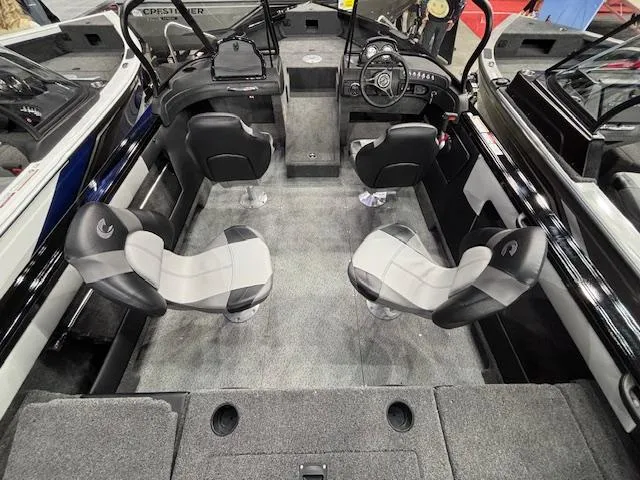 Slide: The Image of 2025 Crestliner 1850 Super Hawk WT JS boat interior with four seats and modern dashboard. - 20