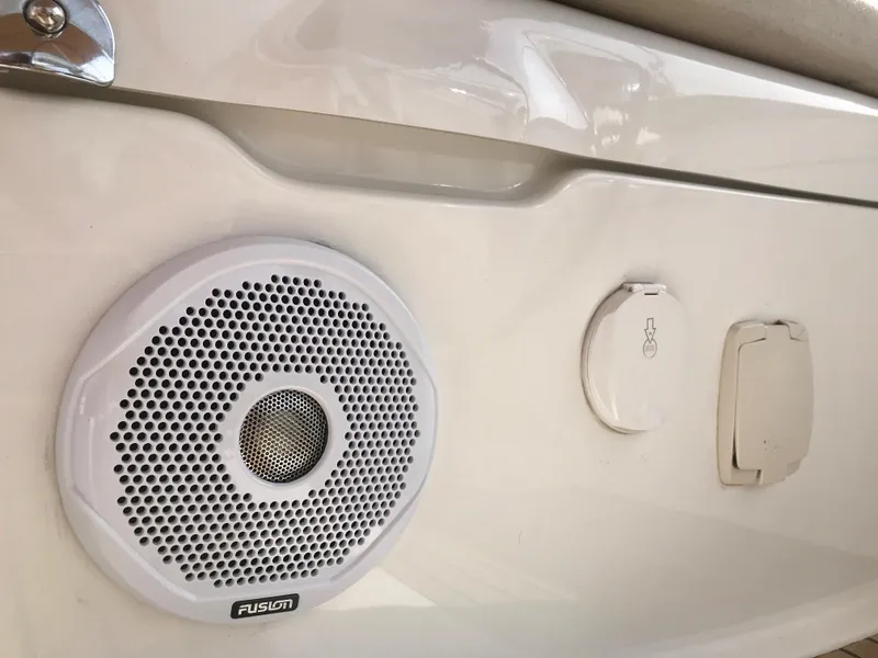Slide: The Image of Jeanneau 57 2014 boat speaker and electrical outlets on white panel. - 25