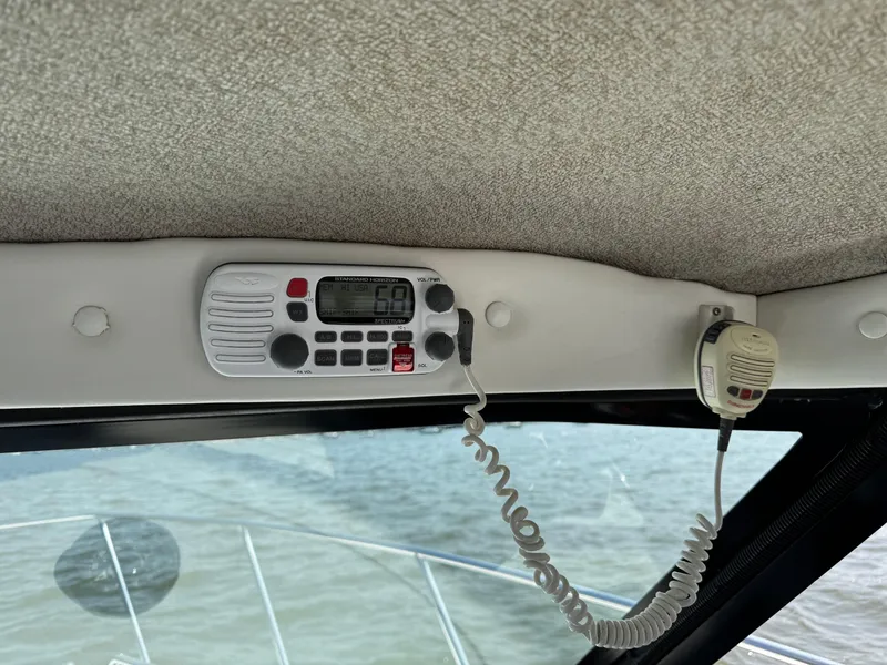 Slide: The Image of 2004 Glacier Bay 2680 Coastal Runner boat radio and microphone setup. - 26