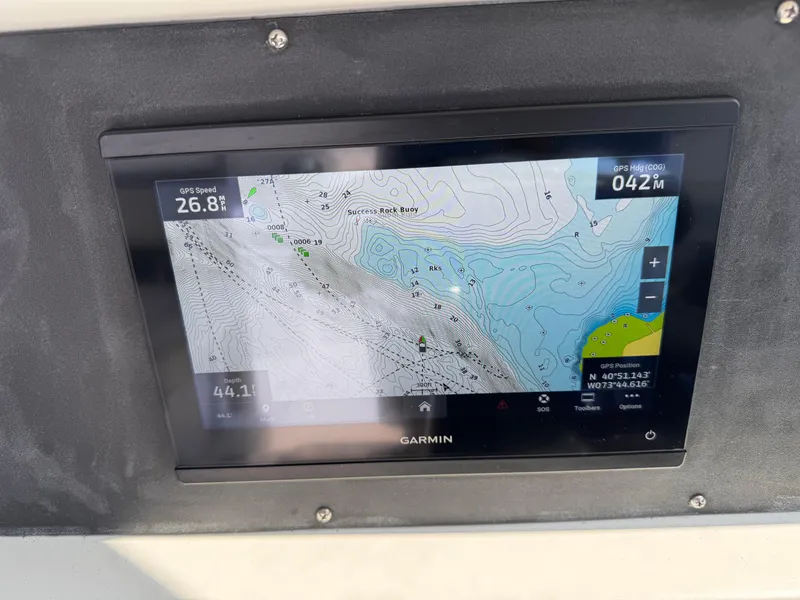 Slide: The Image of Garmin GPS display on 2004 Glacier Bay 2680 Coastal Runner, showing speed and navigation data. - 28