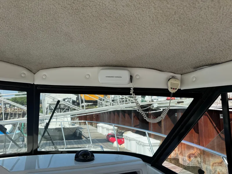 Slide: The Image of Interior view of a 2004 Glacier Bay 2680 Coastal Runner boat with radio equipment. - 39