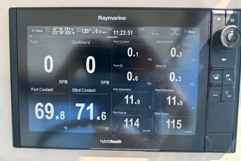 Slide: The Image of Raymarine display on 2018 Boston Whaler 285 Conquest showing engine data and navigation details. - 18