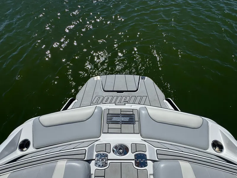 Slide: The Image of 2022 Malibu Wakesetter 24 MXZ boat deck on sparkling water. - 19